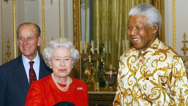 Queen Elizabeth II and the Duke of Edinburgh meet former South African President, Nelson Mandela at Buckingham Palace in 2003