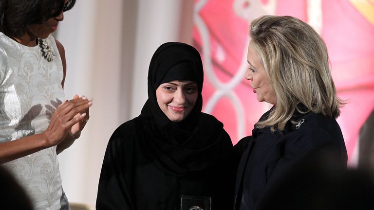 2012: Samar Badawi is presented with an International Women of Courage Award by Hillary Clinton in Washington DC