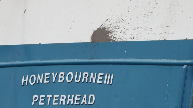 A splatter mark on the stern of the Honeybourne 3, a Scottish scallop dredger, in dock at Shoreham, West Sussex, following clashes with French fishermen
