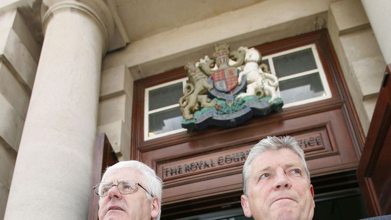 Stanley McComb (R) stood with another victim&#39;s relative Michael Gallagher (L) during a civil case against five accused men