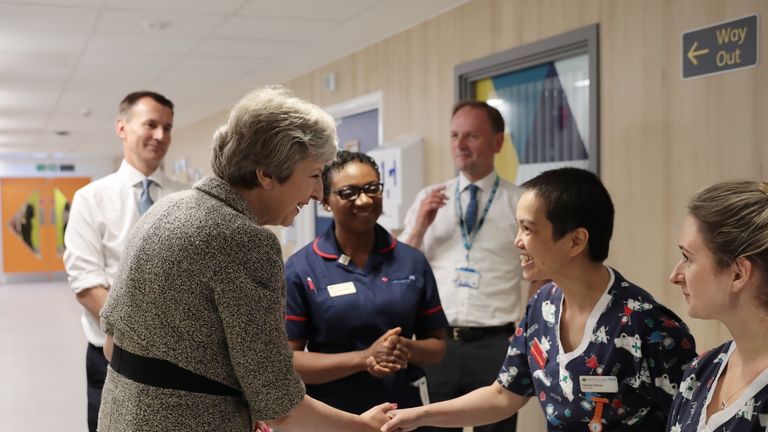 LONDON, ENGLAND - JUNE 18: Britiain&#39;s Prime Minister Theresa May and Secretary of State for Health and Social Care Jeremy Hunt meet nurses during a visit to the Royal Free Hospital on June 18, 2018 in London, England. The Prime Minister will today announce a new package of £20 Billion GBP worth of funding for the NHS. (Photo by Dan Kitwood/Getty Images)

