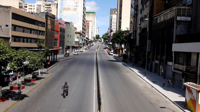 The streets were empty in Caracas on Monday as shops were closed because of the new currency
