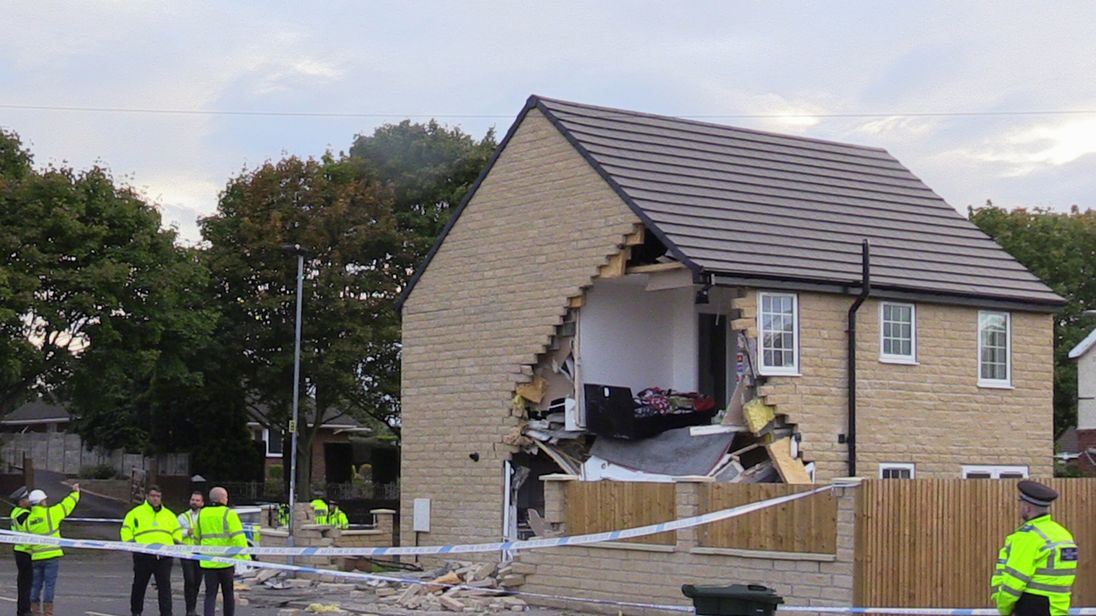 The collision has torn off a corner of a house on the street in Barnsley