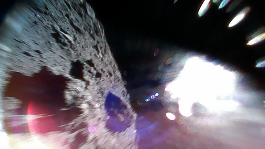 Rover-1A lands on the asteroid surface right