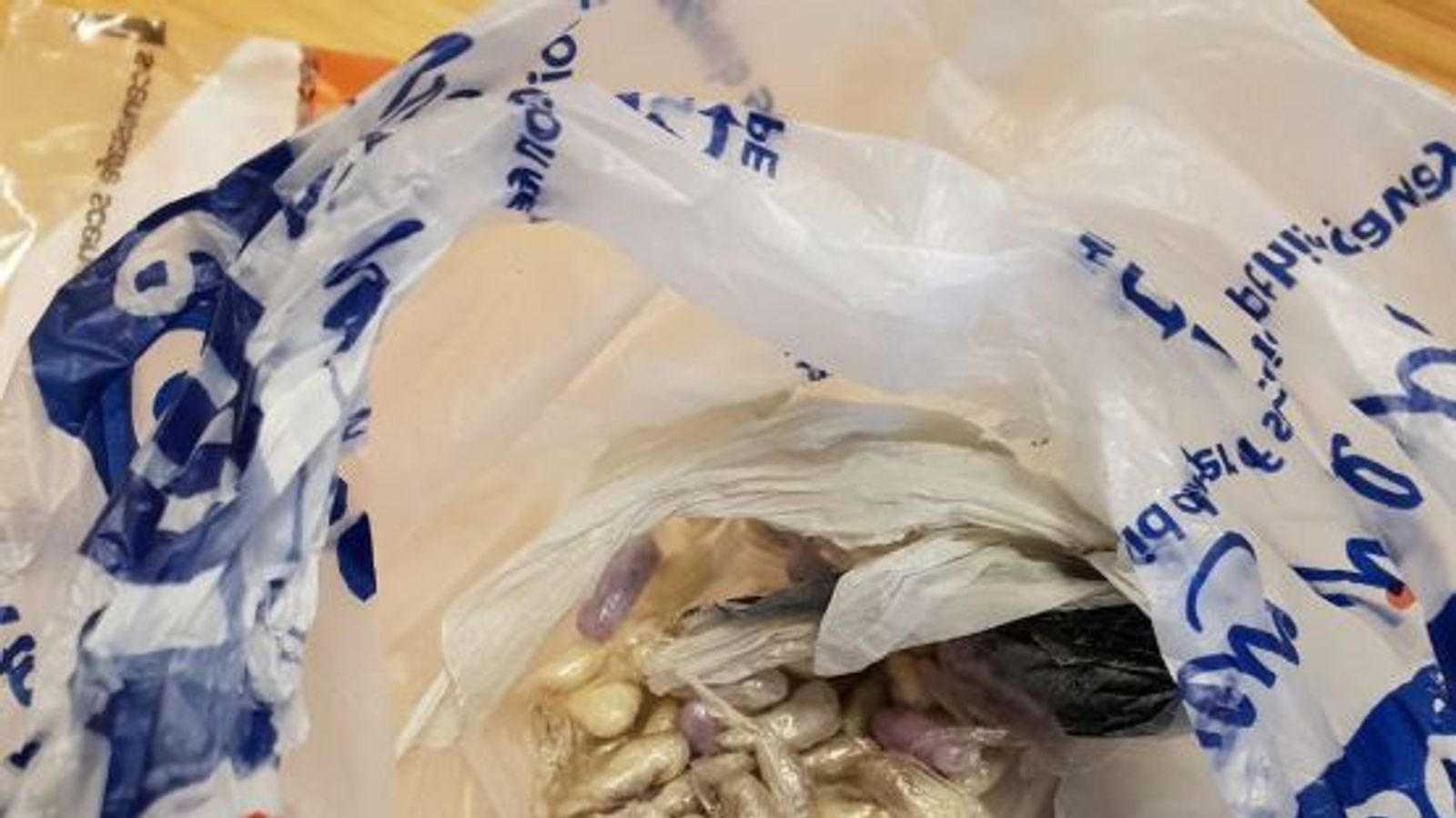 Cat finds bag of 'cocaine and heroin' and brings it home