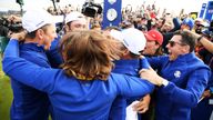 Europe&#39;s golfers, including Francesco Molinari (C) and Rory McIllroy (R) celebrate winning The Ryder Cup 
