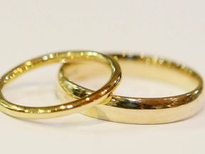 File photo dated 23/04/07 of wedding rings