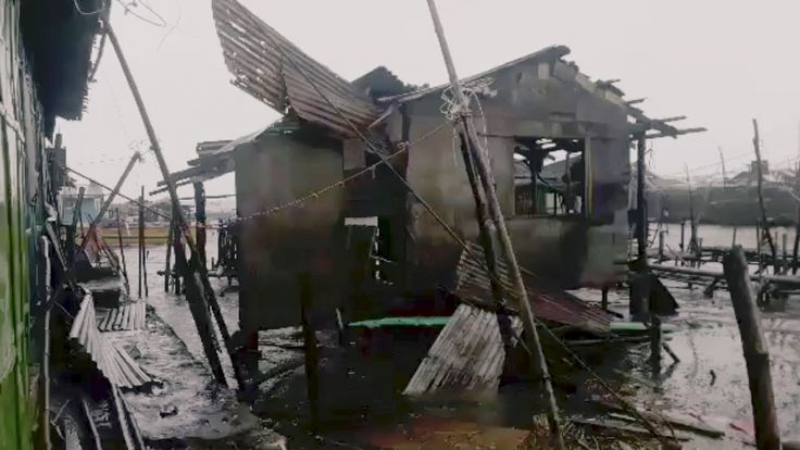 A damaged house in Pangasinan province