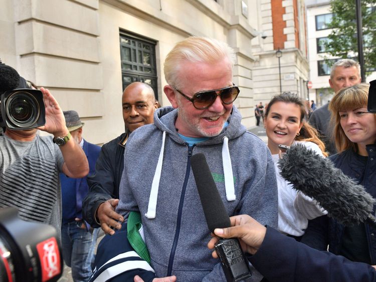 Chris Evans surrounded by media as he leaves the Radio 2 studio in London 