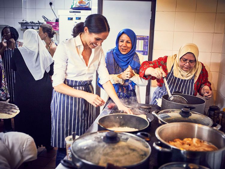   Meghan supports the work of a Grenfell kitchen. Pic: Jenny Zarins 