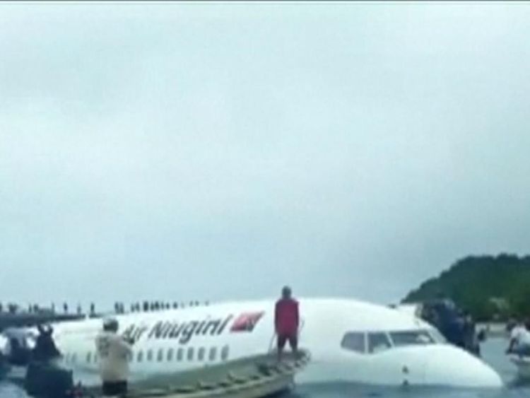 Boats and locals come to the rescue of all the passengers and crew of a plane that crashed into a lagoon of Micronesia