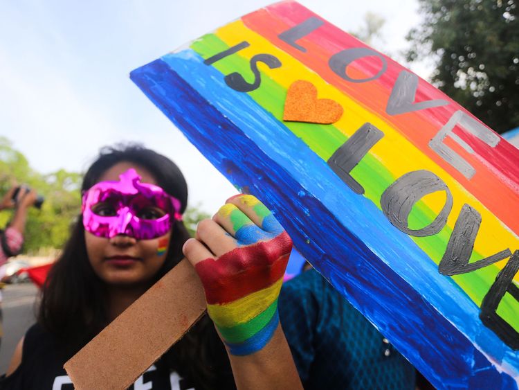 A woman taking part in a pride parade in Bhopal in July