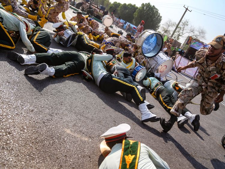 People threw themselves on the ground as bullets began to hammer down on the crowd