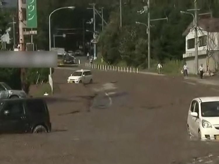Cars buried in mud after an earthquake in Hokkaido, Japan