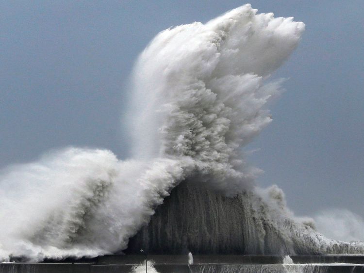 High waves hit breakwaters at a port of Aki, Kochi prefecture, Japan