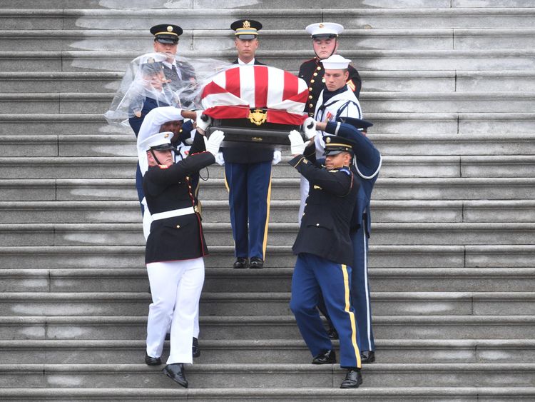 A Military Honour Guard carries Senator McCain's coffin