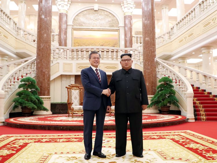 South Korean President Moon Jae-in shakes hands with North Korean leader Kim Jong Un in Pyongyang, North Korea