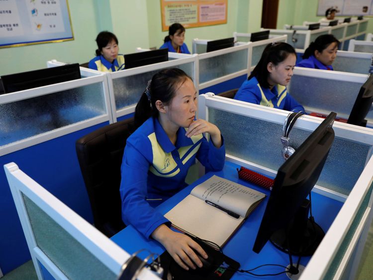 Workers in a cosmetics factory in North Korea