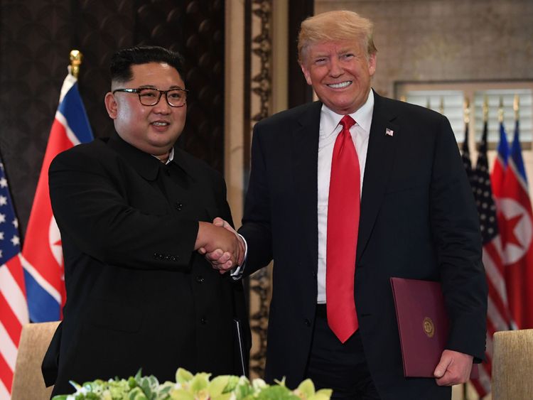 North Korean leader Kim Jong-Un shakes hands with US President Donald Trump during a historic summit of the two nations.