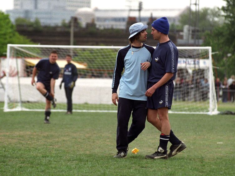 Liam Gallagher of Oasis and Damon Albarn of Blur pictured during a celebrity football match in the mid-1990s