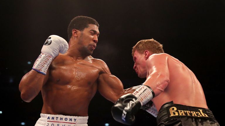 Anthony Joshua throws a left hook