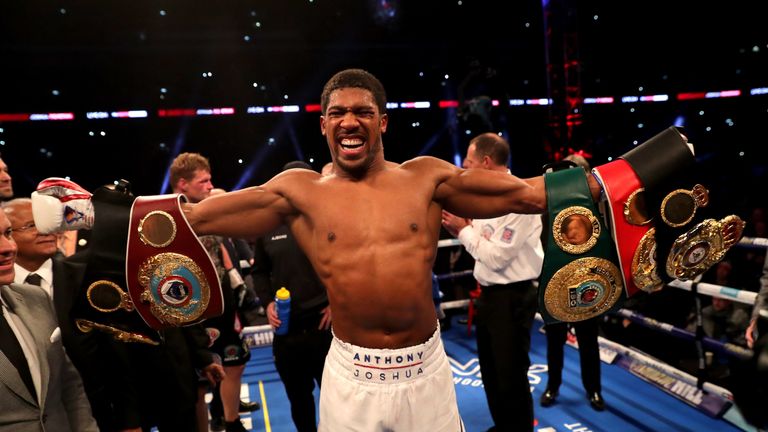 Joshua held on to all three of his titles
