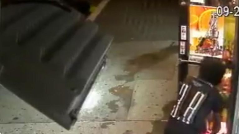 NYPD seek man in connection with an apparent arson attack on a shop in the Bronx