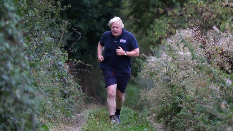Boris Johnson jogs near his home in Oxfordshire