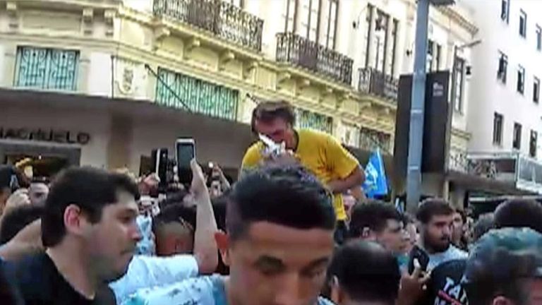 Video grab showing Brazilian right-wing presidential candidate Jair Bolsonaro gesturing after being stabbed 