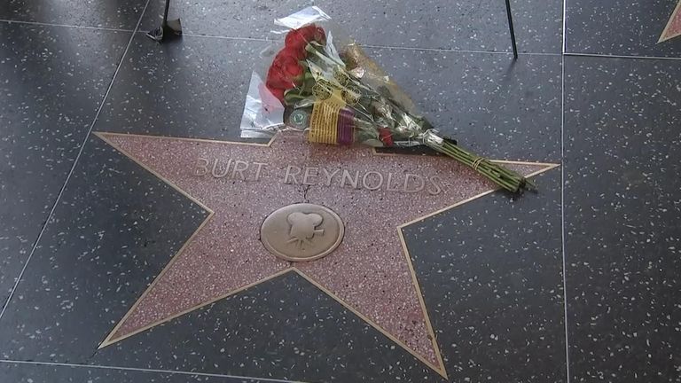 Flowers on Burt Reynolds Walk of Fame square.