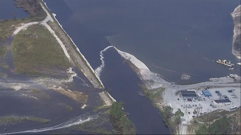 The reservoir flooded into a dump of waste coal ash