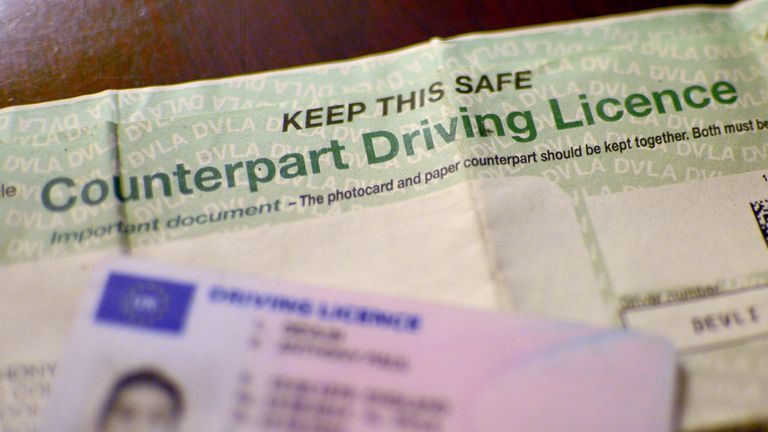 A UK driving licence shown beside a counterpart driving licence, London.
