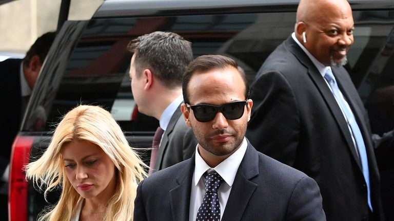 Former Trump Campaign aide George Papadopoulos arrives with his wife Simona Mangiante at district court