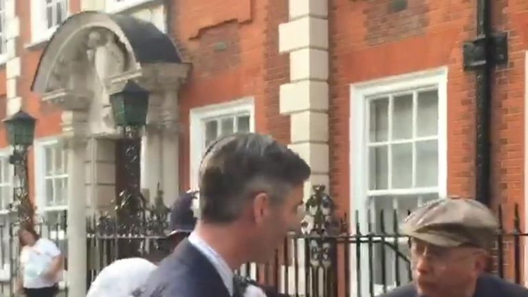 Jacob Rees-Mogg speaks with Class War activist Ian Bone outside his Westminster home