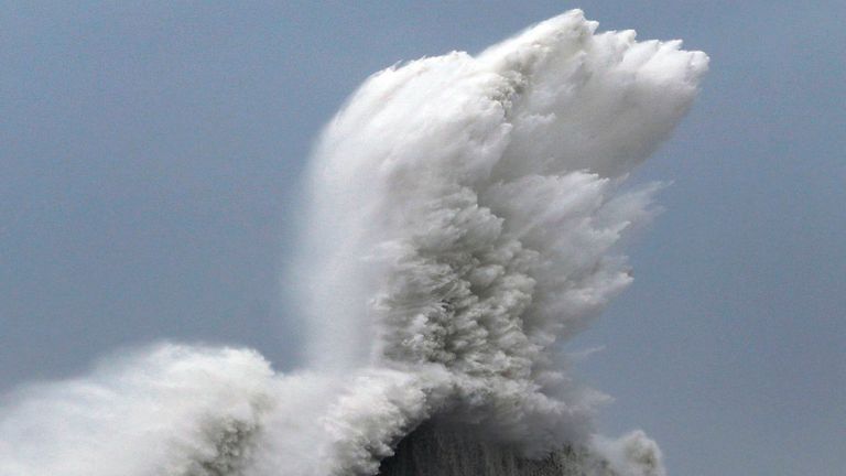 High waves hit breakwaters at a port of Aki, Kochi prefecture, Japan