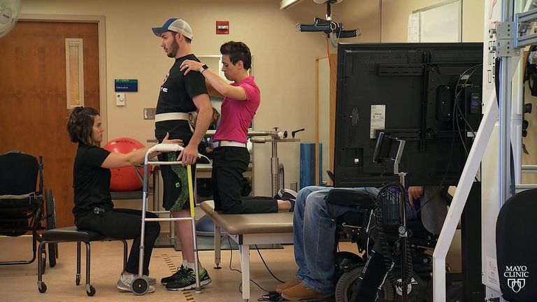 Spinal implant helps paralysed man walk again | US News | Sky News