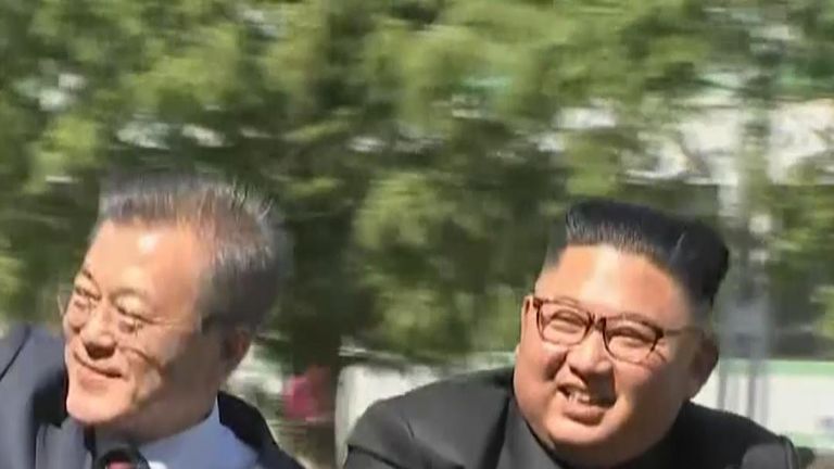 Leaders of North and South Korea ride through Pyongyang