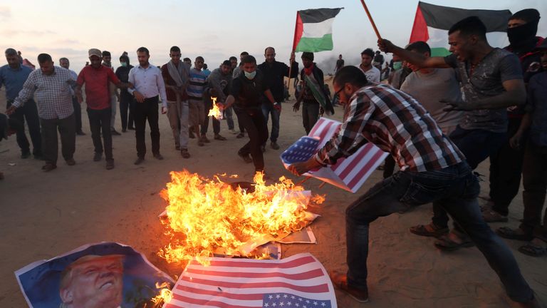 Palestinians burned the US flag and Trump pictures after the US Embassy moved to Jerusalem