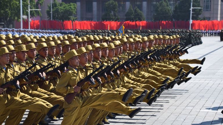 Military personnel march during the parade in Pyongyang