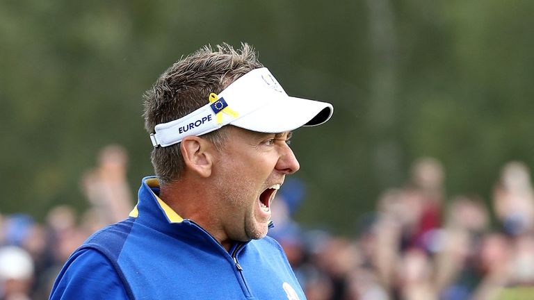 Ian Poulter celebrates during his victory over Dustin Johnson in his singles match of the 2018 Ryder Cup at Le Golf National on September 30, 2018 in Paris, France.