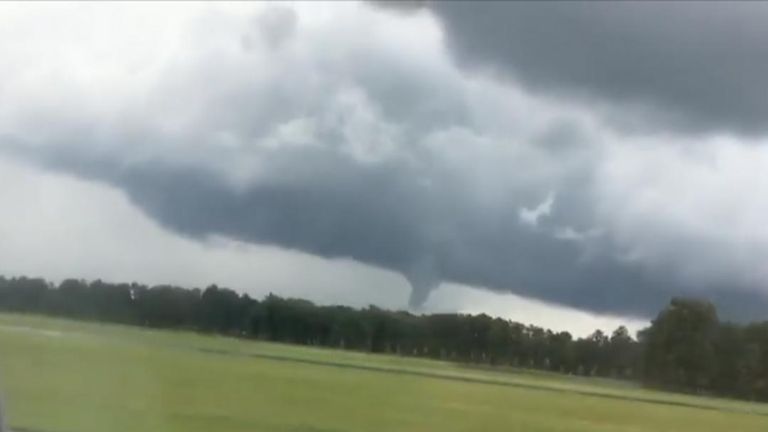 Passenger plane lands near forming tornado in Virginia