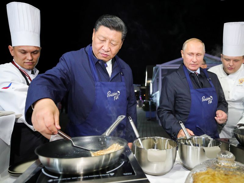 Putin and Xi treat themselves to pancakes, vodka and caviar | News UK Video  News | Sky News