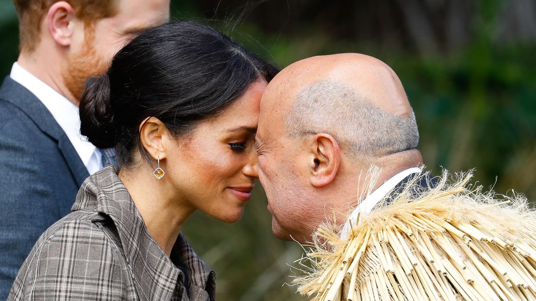 Meghan Duchess of Sussex performing the traditional greeting the 'Hongi' at the Government House
