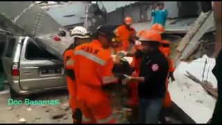 Rescue workers pulled survivors from the rubble in the provincial capital Palu on September 30, after a magnitude-7.4 earthquake and tsunami struck Indonesia’s Central Sulawesi province on September 28, killing at least 832 people.