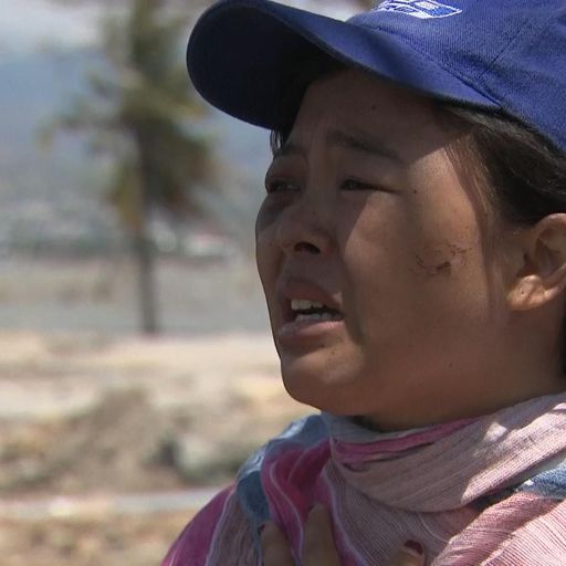 Grieving wife recalls moment she lost husband in quake-tsunami