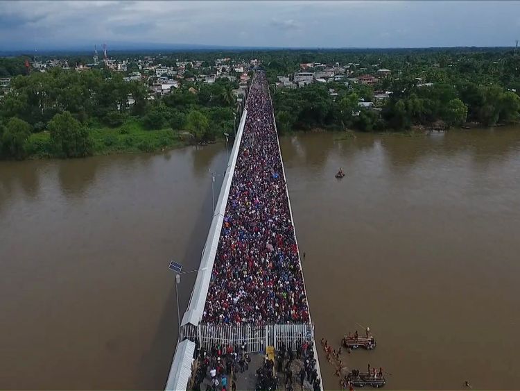 Honduran migrants gather at Guatemala's northern border with Mexico