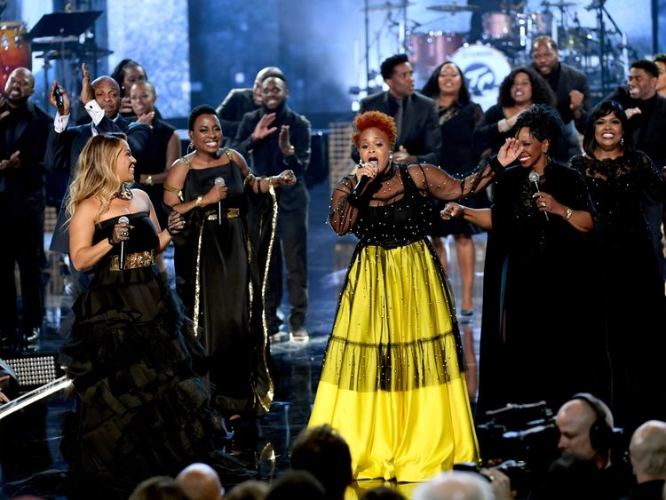 Gladys Knight, Ledisi, Donnie McClurkin, CeCe Winans, Erica Campbell, and Tina Campbell perform a gospel tribute to the late Aretha Franklin onstage during the 2018 American Music Awards 