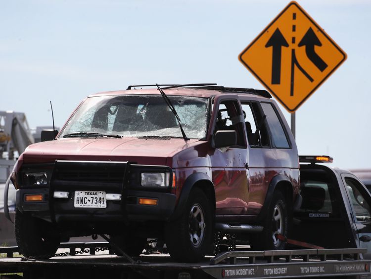 ROUND ROCK, TX - MARCH 21: The vehicle that the Austin package bomber, Mark Anthony Conditt, was driving when he blew himself up is towed from the crime scene along Interstate 35 in suburban Austin on March 21, 2018 in Round Rock, Texas.