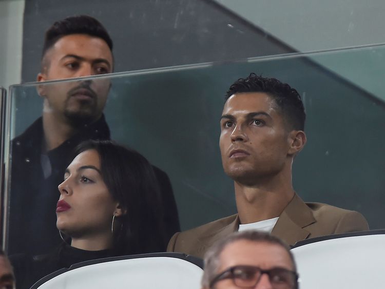 Ronaldo and his girlfriend (left) went to watch his club Juventus play on Tuesday