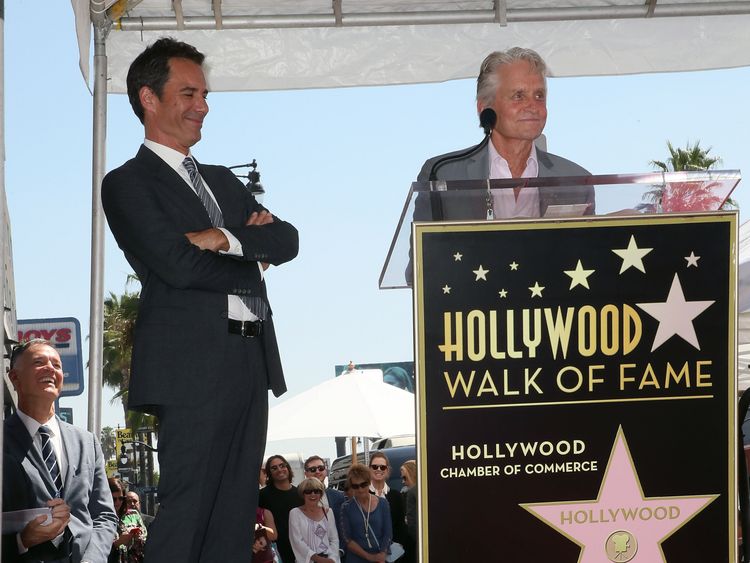 Eric McCormack (L) and Michael Douglas attend Eric McCormack being honored with a Star on the Hollywood Walk of Fame on September 13, 2018 in Hollywood, California. (Photo by David Livingston/Getty Images)